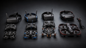 Four beginner FPV drone kits with their included goggles and controllers arranged side by side.