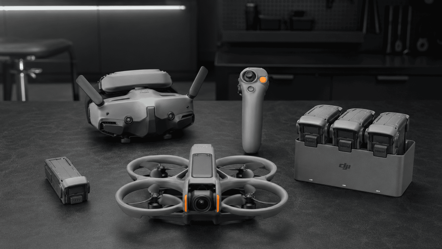 DJI Avata 2 with Goggles 3 and Motion 3, comparing one battery with three batteries in the charging hub.
