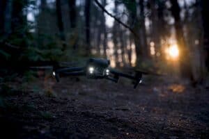 FPV drone navigating around trees with sensors